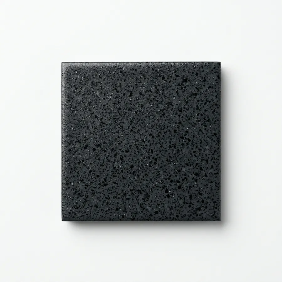 Dark charcoal polyaspartic coating swatch with graphite flake